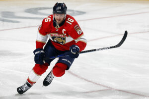 Aleksander Barkov #16 of the Florida Panthers skates for position against the New York Islanders at the FLA Live Arena on November 16, 2021 in Sunrise, Florida.