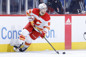 Andrew Mangiapane #88 of the Calgary Flames skates with the puck against the Philadelphia Flyers at Wells Fargo Center on November 16, 2021 in Philadelphia, Pennsylvania.