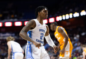 Caleb Love #2 of the University of North Carolina Tar Heels reacts after scoring a basket during the second half of a game against the Tennessee Volunteers at Mohegan Sun Arena on November 21, 2021 in Uncasville, Connecticut.