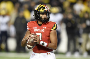 Taulia Tagovailoa #3 of the Maryland Terrapins drops back to pass against the Michigan Wolverines at Capital One Field at Maryland Stadium on November 20, 2021 in College Park, Maryland.