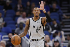 Dejounte Murray #5 of the San Antonio Spurs in action against the Orlando Magic during the first half at Amway Center on November 05, 2021 in Orlando, Florida.