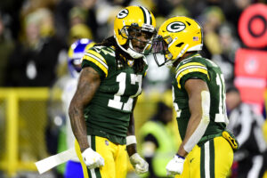 Randall Cobb #18 of the Green Bay Packers celebrates his touchdown catch with Davante Adams #17 during the second quarter against the Los Angeles Rams at Lambeau Field on November 28, 2021 in Green Bay, Wisconsin. 