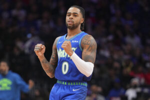 D'Angelo Russell #0 of the Minnesota Timberwolves reacts against the Philadelphia 76ers at the Wells Fargo Center on November 27, 2021 in Philadelphia, Pennsylvania. The Timberwolves defeated the 76ers 121-120 in double overtime.