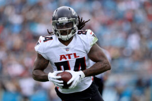 Cordarrelle Patterson #84 of the Atlanta Falcons runs for a touchdown during the game against the Jacksonville Jaguars at TIAA Bank Field on November 28, 2021 in Jacksonville, Florida.