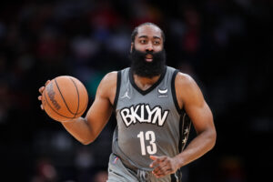 James Harden #13 of the Brooklyn Nets controls the ball during the second half against the Houston Rockets at Toyota Center on December 08, 2021 in Houston, Texas. 