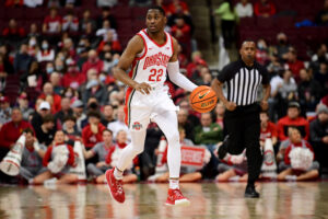 Malaki Branham #22 of the Ohio State Buckeyes drives the ball during the first half of their game against the Towson Tigers at Value City Arena on December 08, 2021 in Columbus, Ohio.