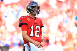 Tom Brady #12 of the Tampa Bay Buccaneers reacts Buffalo Bills during the first half at Raymond James Stadium on December 12, 2021 in Tampa, Florida.