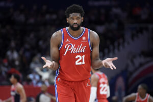 Joel Embiid #21 of the Philadelphia 76ers celebrates in the second half against the Washington Wizards at Capital One Arena on December 26, 2021 in Washington, DC.