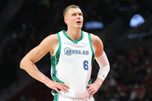 Kristaps Porzingis #6 of the Dallas Mavericks reacts against the Portland Trail Blazers during the first quarter at Moda Center on December 27, 2021 in Portland, Oregon.