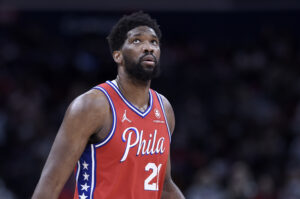 Joel Embiid #21 of the Philadelphia 76ers rests during a break in the game against the Washington Wizards at Capital One Arena on December 26, 2021 in Washington, DC.