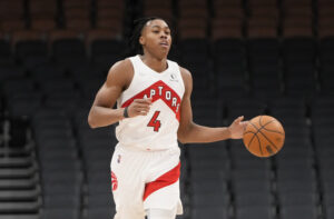 Scottie Barnes #4 of the Toronto Raptors dribbles against the San Antonio Spurs during the second half of their basketball game at the Scotiabank Arena on January 4, 2022 in Toronto, Ontario, Canada. 