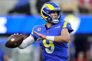 Matthew Stafford #9 of the Los Angeles Rams looks to throw the ball in the fourth quarter against the San Francisco 49ers at SoFi Stadium on January 09, 2022 in Inglewood, California.