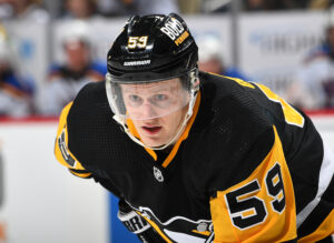 Jake Guentzel #59 of the Pittsburgh Penguins skates against the St. Louis Blues at PPG PAINTS Arena on January 5, 2022 in Pittsburgh, Pennsylvania.