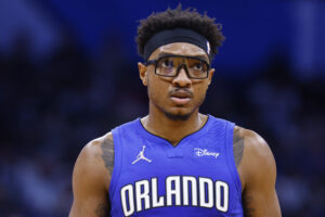 Wendell Carter Jr. #34 of the Orlando Magic looks on against the Milwaukee Bucks at Amway Center on December 30, 2021 in Orlando, Florida.