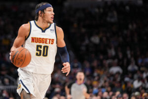 Aaron Gordon #50 of the Denver Nuggets dribbles against the Memphis Grizzlies at Ball Arena on January 21, 2022 in Denver, Colorado. 