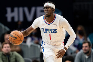 Reggie Jackson #1 of the Los Angeles Clippers brings the ball up court against the Charlotte Hornets during their game at Spectrum Center on January 30, 2022 in Charlotte, North Carolina.