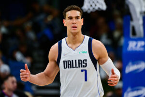 Dwight Powell #7 of the Dallas Mavericks reacts during the second half