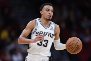 Tre Jones #33 of the San Antonio Spurs in action against the Houston Rockets at Toyota Center on January 25, 2022 in Houston, Texas. 