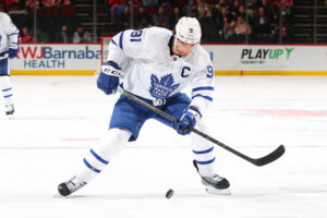 John Tavares #91 of the Toronto Maple Leafs skates during the game against the New Jersey Devils on February 1, 2022 at the Prudential Center in Newark, New Jersey.