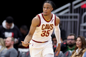 Isaac Okoro #35 of the Cleveland Cavaliers reacts to a three point basket during the first half against the Houston Rockets at Toyota Center on February 02, 2022 in Houston, Texas. 