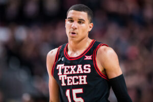 Guard Kevin McCullar #15 of the Texas Tech Red Raiders stands on the court during the second half of the college basketball game against the Texas Longhorns at United Supermarkets Arena on February 01, 2022 in Lubbock, Texas.