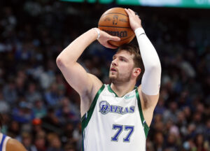 Dallas Mavericks guard Luka Doncic shoots a free throw against the Philadelphia 76ers