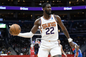 Deandre Ayton #22 of the Phoenix Suns handles the ball in the third quarter against the Washington Wizards at Capital One Arena on February 05, 2022 in Washington, DC.