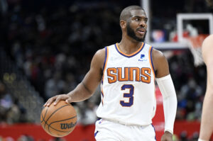 Chris Paul #3 of the Phoenix Suns handles the ball against the Washington Wizards at Capital One Arena on February 05, 2022 in Washington, DC.