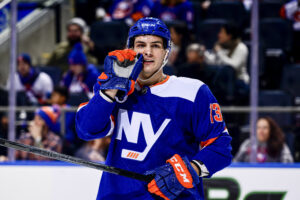 Mathew Barzal #13 of the New York Islanders speaks to his teammates prior to the face-off against the Seattle Kraken at UBS Arena on February 02, 2022 in Elmont, New York.