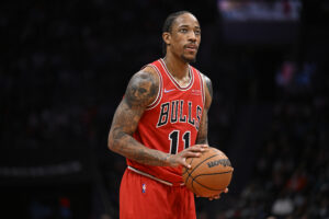 DeMar DeRozan #11 of the Chicago Bulls shoots a free throw against the Charlotte Hornets during their game at Spectrum Center on February 09, 2022 in Charlotte, North Carolina. The Bulls won 121-109.