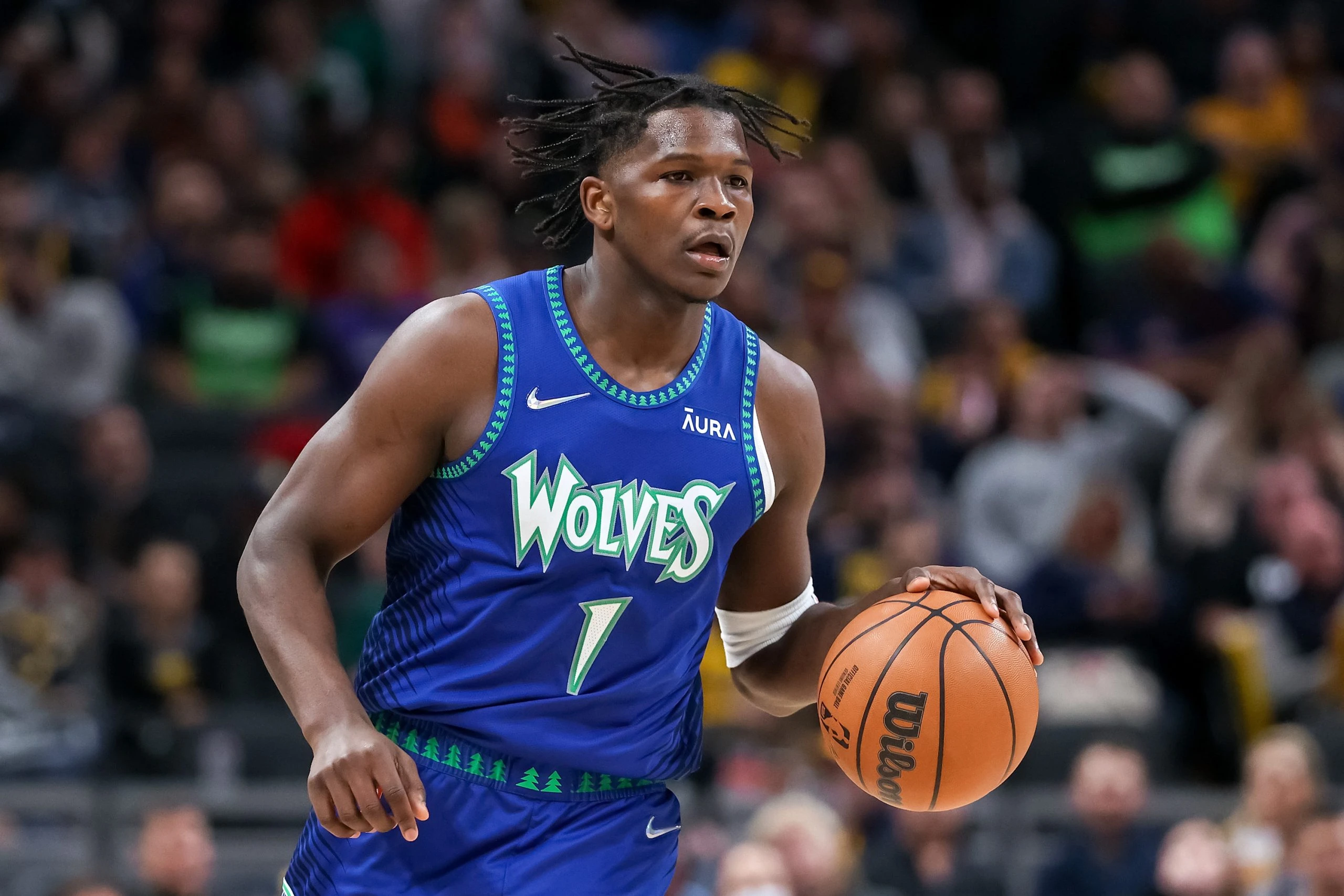 Anthony Edwards #1 of the Minnesota Timberwolves dribbles the ball in the second quarter against the Indiana Pacers at Gainbridge Fieldhouse on February 13, 2022 in Indianapolis, Indiana.