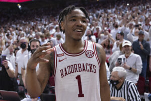 Arkansas Razorbacks guard JD Notae celebrates after an overtime win against the Auburn Tigers