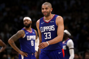 Nicolas Batum #33 of the Los Angeles Clippers reacts to a play during the second quarter against the Golden State Warriors at Crypto.com Arena on February 14, 2022 in Los Angeles, California.