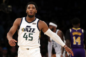 Donovan Mitchell #45 of the Utah Jazz reacts after a play during the second quarter against the Los Angeles Lakers at Crypto.com Arena on February 16, 2022 in Los Angeles, California.