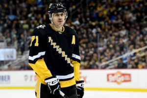 Evgeni Malkin #71 of the Pittsburgh Penguins looks on during the third period against the New York Rangers at PPG PAINTS Arena on February 26, 2022 in Pittsburgh, Pennsylvania.