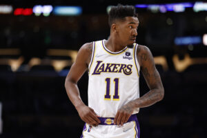 Malik Monk #11 of the Los Angeles Lakers looks on against the New Orleans Pelicans during the first half at Crypto.com Arena on February 27, 2022 in Los Angeles, California. The New Orleans Pelicans won 123-95.