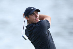 Rory McIlroy of Northern Ireland plays a shot on the 18th hole during his practice round prior to THE PLAYERS Championship on the Stadium Course at TPC Sawgrass on March 08, 2022 in Ponte Vedra Beach, Florida.