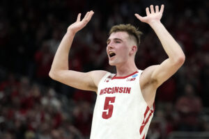 Tyler Wahl #5 of the Wisconsin Badgers reacts in the second half against the Colgate Raiders during the first round of the 2022 NCAA Men's Basketball Tournament at Fiserv Forum