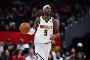 Will Barton #5 of the Denver Nuggets brings the ball up court against the Washington Wizards during the first half at Capital One Arena on March 16, 2022 in Washington, DC.