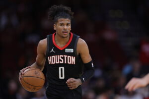 Jalen Green #0 of the Houston Rockets controls the ball during the first quarter against the Washington Wizards at Toyota Center on March 21, 2022 in Houston, Texas.