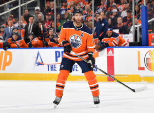 Darnell Nurse #25 of the Edmonton Oilers skates during the game against the New Jersey Devils on March 19, 2022 at Rogers Place in Edmonton, Alberta, Canada.