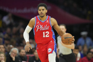 Tobias Harris #12 of the Philadelphia 76ers dribbles the ball against the Miami Heat at the Wells Fargo Center on March 21, 2022 in Philadelphia, Pennsylvania. The 76ers defeated the Heat 113-106.