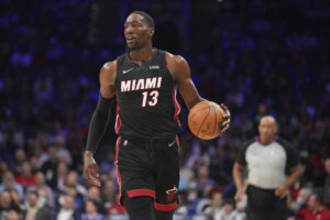 Bam Adebayo #13 of the Miami Heat dribbles the ball against the Philadelphia 76ers at the Wells Fargo Center on March 21, 2022 in Philadelphia, Pennsylvania.