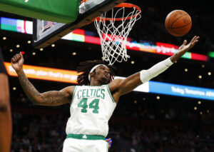 Robert Williams III #44 of the Boston Celtics rebounds during the second quarter of the game against the Utah Jazz at TD Garden on March 23, 2022 in Boston, Massachusetts.