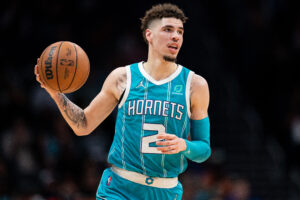 LaMelo Ball #2 of the Charlotte Hornets brings the ball up court against the New York Knicks during their game at Spectrum Center on March 23, 2022 in Charlotte, North Carolina.