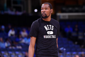 Kevin Durant #7 of the Brooklyn Nets warms up before the game against the Memphis Grizzlies at FedExForum on March 23, 2022 in Memphis, Tennessee.