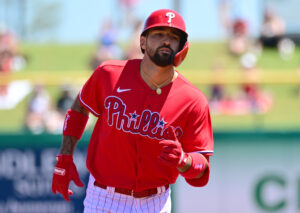 Nick Castellanos #8 of the Philadelphia Phillies runs the bases after hitting a two-run home run in the first inning against the Baltimore Orioles during the spring training game at BayCare Ballpark on March 28, 2022 in Clearwater, Florida.