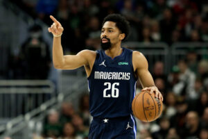 Spencer Dinwiddie #26 of the Dallas Mavericks calls out a play during the second half of the game against the Milwaukee Bucks at Fiserv Forum on April 03, 2022 in Milwaukee, Wisconsin.