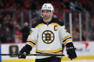 Patrice Bergeron #37 of the Boston Bruins skates against the Washington Capitals during the first period at Capital One Arena on April 10, 2022 in Washington, DC.