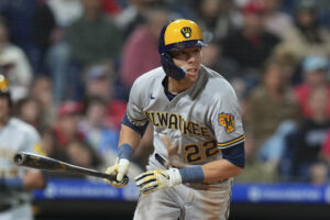 Christian Yelich #22 of the Milwaukee Brewers bats against the Philadelphia Phillies at Citizens Bank Park on April 22, 2022 in Philadelphia, Pennsylvania. The Philadelphia Phillies defeated the Milwaukee Brewers 4-2.